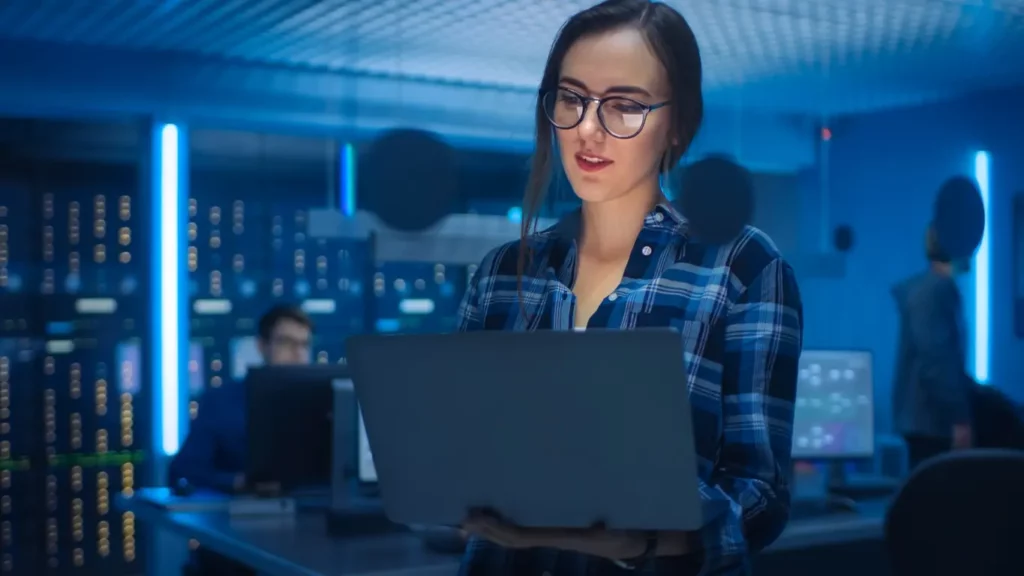 female programmer working on her laptop